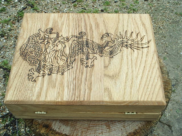 Brass hinges on this Asian Dragon Oak Box